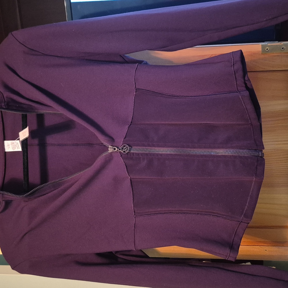 New with tags, zip jacket.